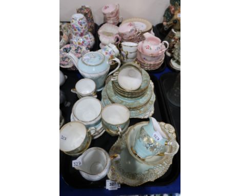 A Tuscan blue and gilt decorated part tea service, a similar Aynsley C1436 coffee service, lady artist hand painted cups and 