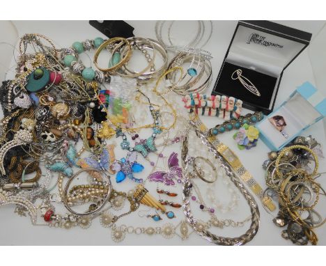 A silver babies bangle, Mackintosh silver brooch and other items of silver and costume jewellery Condition Report: Not availa