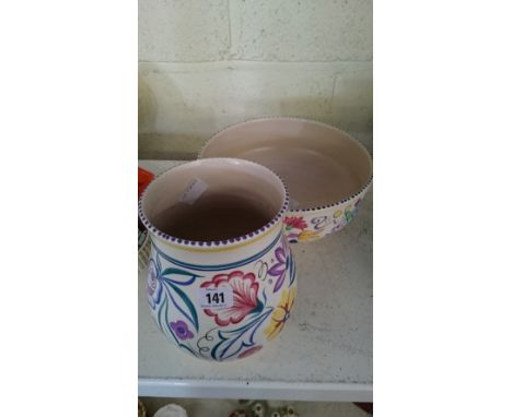 A large white bodied Poole Pottery fruit bowl decorated in the BN pattern together with a large CS pattern white bodied vase.