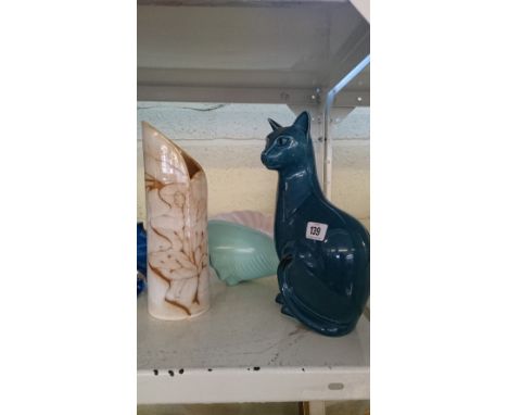 A Poole Pottery blue glazed Vogue cat together with a large twin tone shell vase and a Calypso vase, shape 580. 