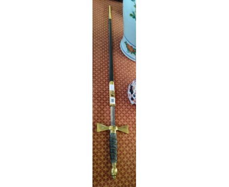 A Masonic sword with brass handle and leather and brass scabbard by Kenning with wire bound handle.