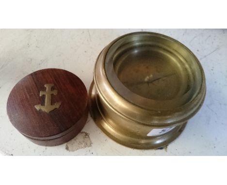 A small brass compass together with another in wooden case.