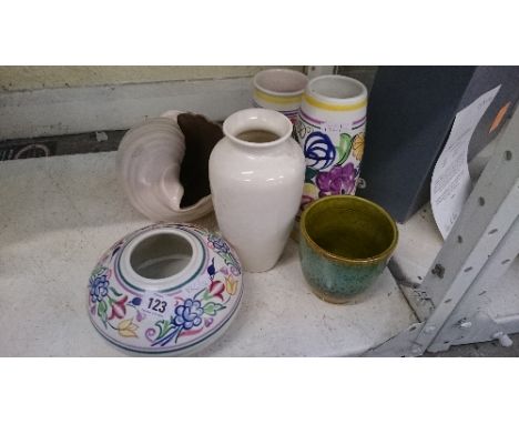 Six various Poole Pottery items.