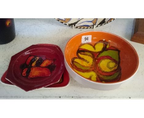 A Poole Pottery Delphis bowl, shape 88 decorated by Cynthia Bennett together with two Poole Pottery small dishes.