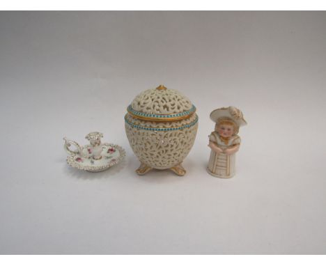 A Grainger (Worcester) reticulated potpourri pot and cover together with a figural Worcester candle snuff and a miniature G. 