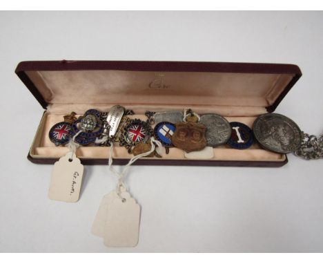 A collection of enamel badges, commemorative medals (Austrailian/ Commonwealth) silver war time identity bracelets, etc 