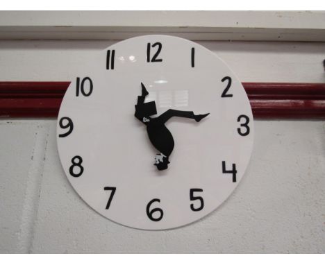 A Monty Python "Funny Walk" wall clock, 30cm diameter 