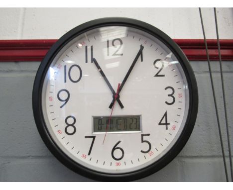 A wall clock with date, day and temperature display, 38cm diameter 