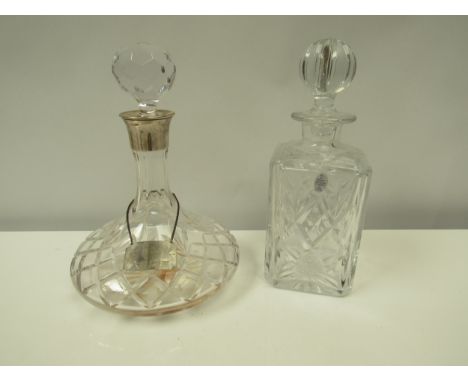 A Royal Doulton crystal glass decanter by Webb Corbett and a ships decanter with silver collar by J.A. Campbell, with associa