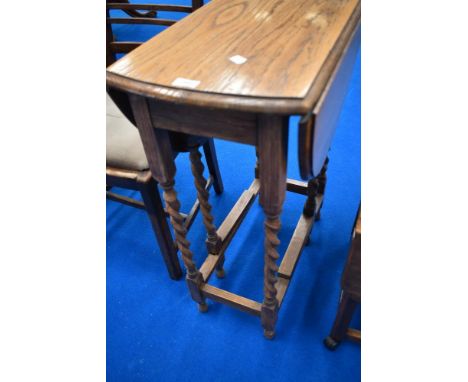 A mid 20th Century oak twist gate leg occasional table