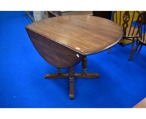 A mid to late 20th Century mid/dark stained Ercol or similar gateleg table