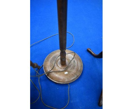 A traditional stained frame standard lamp
