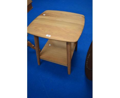 A modern natural wood occasional tabke, similar to Ercol