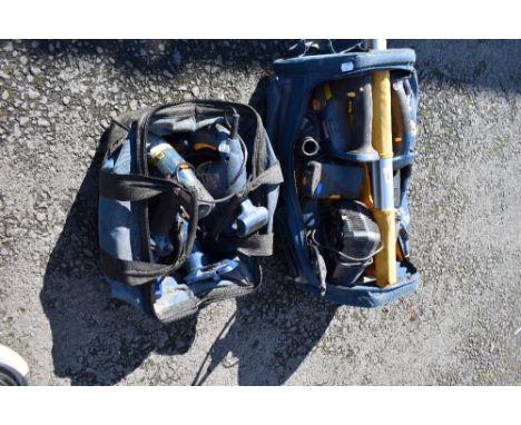Two tool bags containing large selection of power tools and batteries etc, mainly Ryobi