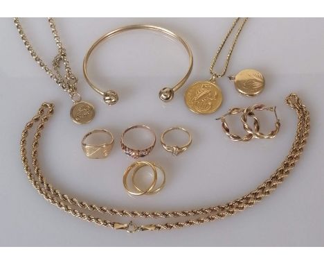 An assortment of gold jewellery to include two wedding bands, one 22ct, 2mm, 3g, the other 18ct, 3mm, 2g; three 9ct rings, on