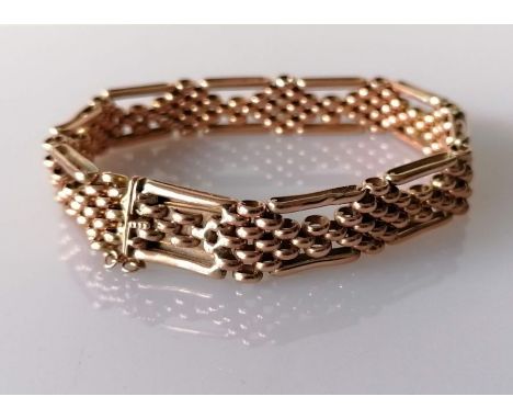 A rose gold gate-link bracelet, 18cm, stamped 9ct, 15.6g