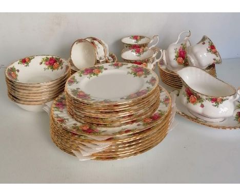 A fifty-piece Royal Albert Old Country Roses tea service comprising eight cups/saucers/plates, eight cereal bowls, side plate