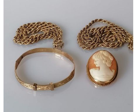 Two yellow gold rope-twist chains, 37, 44 cm, clasps good; a child's gold bangle with etched decoration, 14g and a gold-frame