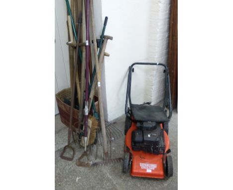 A sterling cyclone sprint 375 petrol lawn mower, together with a small selection of garden tools