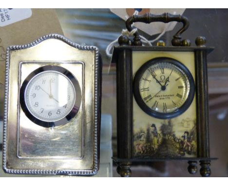 A silver framed easel clock London 1993, 8cm high and a miniature carriage clock with erotic panels, 9cm high (2)