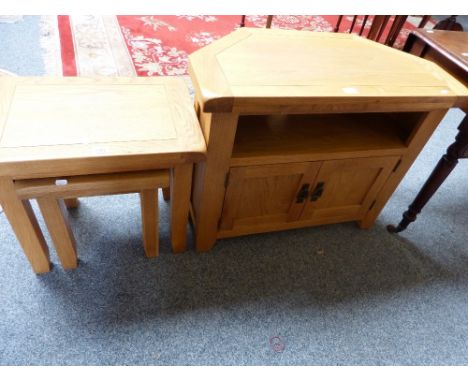 An oak corner television stand, 80cm wide, together with a graduated nest of two light oak tables (2)