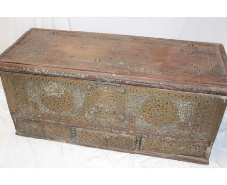 An Eastern brass mounted hardwood rectangular trunk with part fitted interior and hinged lid, 43" long
