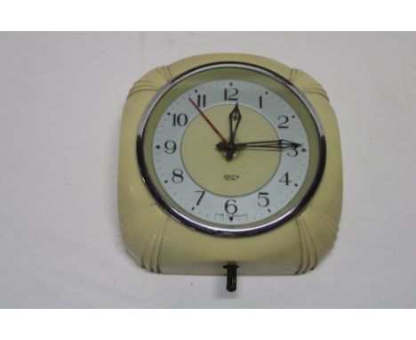 A vintage Smith's electric Art Deco wall clock in white bakelite case, 6½" wide