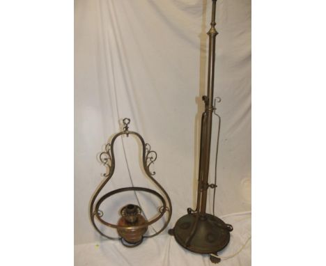 An old brass rise-and-fall lamp stand, converted to electric together with a brass hanging oil lamp with scroll decoration (2