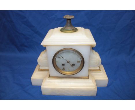 A 19th century French mantel clock with circular dial in polished white marble and brass mounted rectangular case