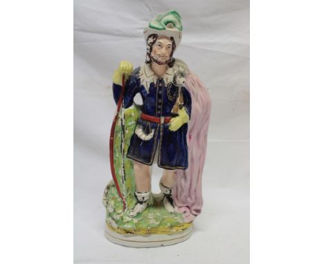 A Victorian Staffordshire pottery figure of a traveller with cloak, 16" high