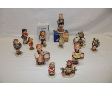 A collection of twelve various Hummel china figures of children including two boxed examples