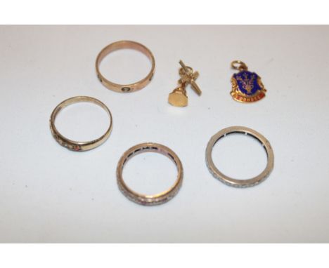 A 9ct gold wedding band, 9ct gold eternity-style ring, 9ct gold fob and other jewellery, etc