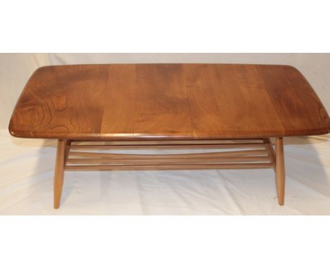 A 1960's Ercol light elm rectangular coffee table, 41" long