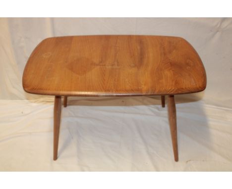 A 1960's Ercol light elm rectangular coffee table, 29" long