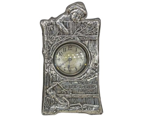 Unusual Silver Fronted mantel Clock. Birmingham 1906. Appears to keep time. Front depicts a ruffian boy looking over a wall i