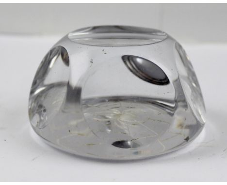 A FACETED GLASS PAPERWEIGHT engraved spider in web decoration 