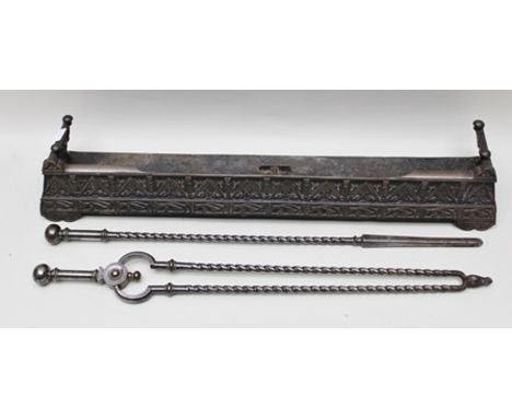 A PAIR OF 19TH CENTURY BRIGHT STEEL FIRE TOOLS, a poker and a pair of tongs, having barley twist shafts, together with a cast