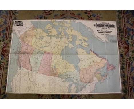 A LARGE FOLD OUT LINEN BACKED MAP OF "THE DOMINION OF CANADA 1905" issued by direction of Hon. Frank Oliver, Minister of the 