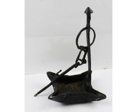 AN 18TH/19TH CENTURY HAND FORGED CRUISE WHALE OIL LAMP with suspension hook and four wick spouts, 17cm high 