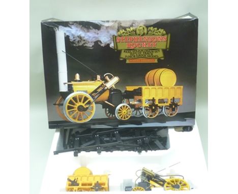 A HORNBY RAILWAYS LIVE STEAM "STEPHENSON'S ROCKET", 3 1/2" gauge, comprising engine with tender and 25' of track in original 