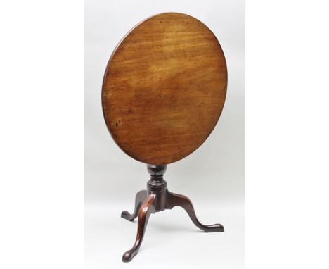 A GEORGE III MAHOGANY SNAP-TOP WINE TABLE, raised on turned stem with arched tripod supports, 74cm diameter 