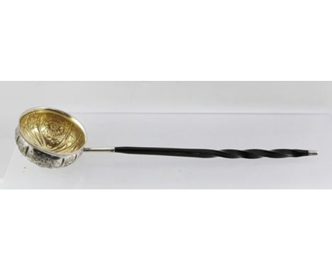 FRANCIS BOONE THOMAS & CO. A VICTORIAN SILVER TODDY LADLE having floral decorated repousse bowl, gilded to the interior, with