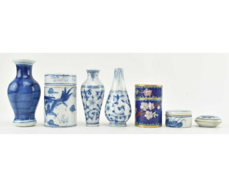 A collection of seven 19th century and later Chinese small blue and white items. The lot comprising a small baluster vase in 