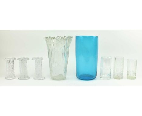 A collection of eight mid century Scandinavian and British art glass vases. The lot comprising a Whitefriars style cylindrica