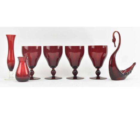 A collection of vintage 20th century ruby glass items. The lot to comprise a 1960s Whitefriars swan, a Whitefriars vase patte