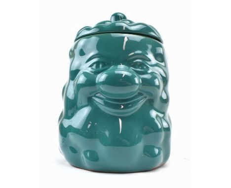 An unusual vintage green painted glazed terracotta lidded pot in the form of a potato man. The lidded pot with face &amp; pai
