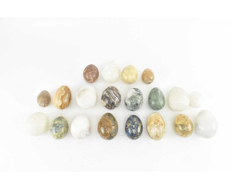 A collection of twenty vintage polished stone and marble egg paperweights. Various colourways &amp; styles.Largest measures a