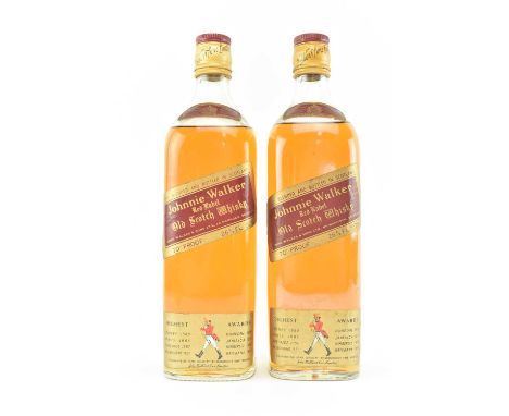 Two Johnny Walker Red Label Old Scotch Whisky 70% proof bottles. Each 26 2/3 Fl. Ozs. Seals intact.