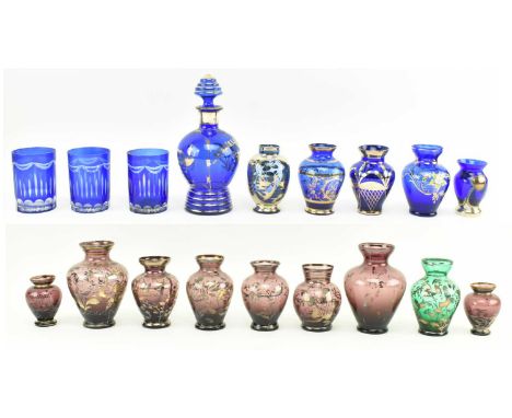 A collection of eighteen vintage 20th century overlaid glass bud vases in hues of amethyst, green &amp; cobalt blue, in the s