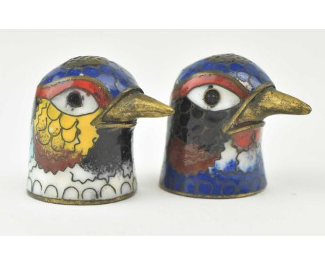 Two early 20th century Chinese cloisonne thimbles, each in the form of a bird head. With colourful cloisonne enamel feathered